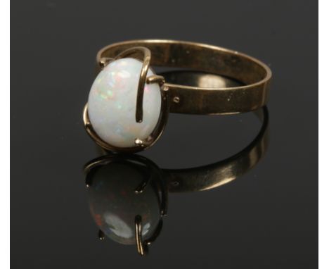 A ladies 9ct gold opal ring size Q, 2.20 grams. 