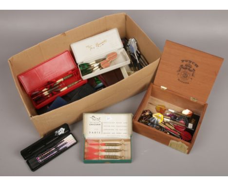 A box of vintage darts and accessories including boxed unicorn darts and tru flight etc 