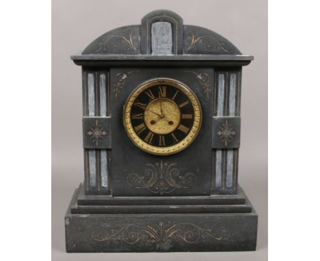 A large black slate mantel clock with ornate brass dial, 50cm x 40cm. 