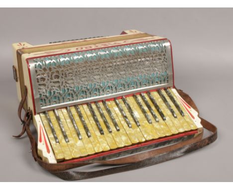 A cased German Pietro piano accordion. 