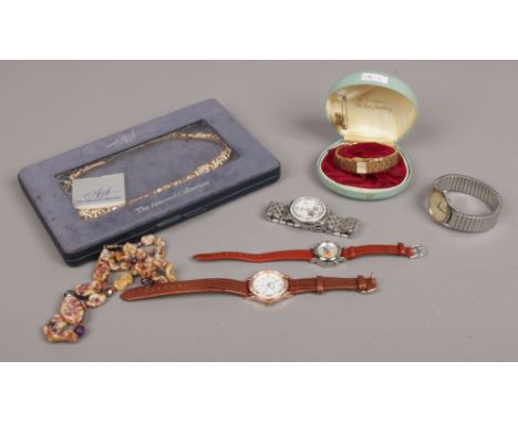 A small quantity of costume jewellery to include expanding roamer manual wristwatch, Attwood collection necklace. 