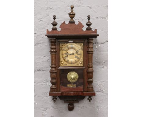 A 1908 Junghans 15 day time and strike wall clock. 