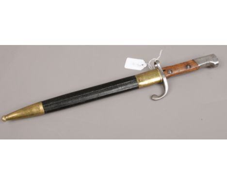 Weyersberg Kirschbaum &amp; Co. Solingen German bayonet with associated brass and leather scabbard. 