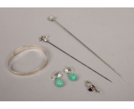 A Charles Horner silver openwork brooch, similar silver hatpin and one other, a Charles Horner engraved expanding silver bang