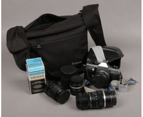 A Praktica 35mm MTL 5 B camera in protective case with various lenses 1600A electronic flash gun, filters and canon carry bag