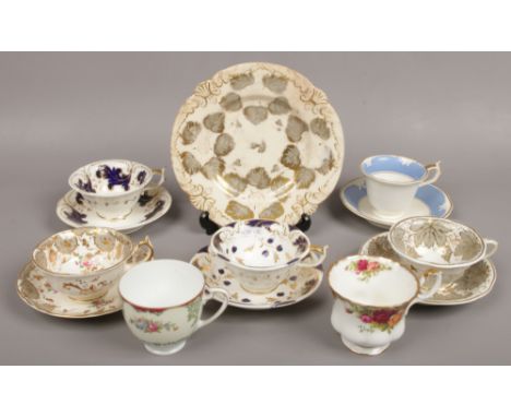 A collection of ceramic cups and saucers to include Rockingham, Noritake etc. 