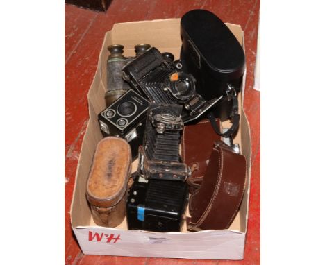 A box of cameras and binoculars to include AGFA Bellows camera, C. P. Goerz Treider binoculars etc. 