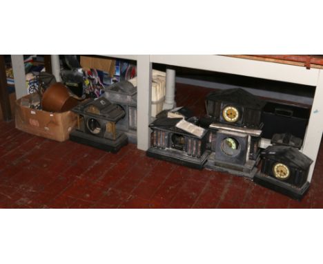 A collection of slate mantle clock cases various shapes and sizes, along with a box of mantle clocks parts. 