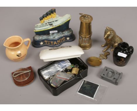 A group of collectables, Glenmorangie and QE2 malt Whiskey ceramic jugs, brass miners lamp, dog, Edward VIII spoon. 