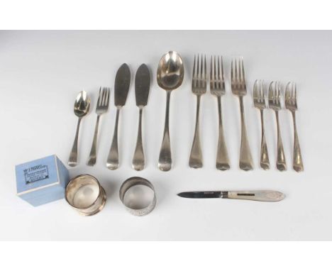 An Edwardian part canteen of silver Old English pattern cutlery, comprising three table forks, tablespoon and two fish knives