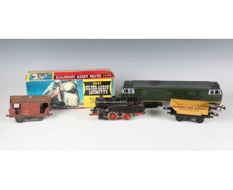 A Bing gauge O tinplate clockwork locomotive and tender LMS, a Lima plastic diesel locomotive, a GFN 0-4-0 tank locomotive, a