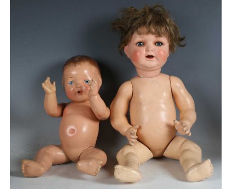 A Heubach Köppelsdorf bisque head doll, impressed '342.2 Germany', with brown wig, sleeping blue eyes and bent limb compositi