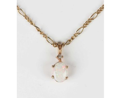 A 9ct gold, opal and diamond pendant, length 1.5cm, with a 9ct gold Figaro neckchain, length 50.5cm, total weight 4.1g.