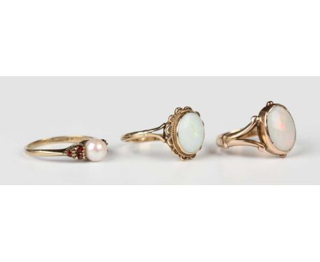 A 9ct gold and opal single stone ring, collet set with the oval opal between split shoulders, Chester 1919, ring size approx 