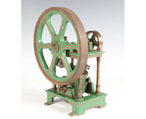 A live steam model of an oscillating over-crank single-cylinder steam engine with 18cm and 6cm flywheels, finished in green w