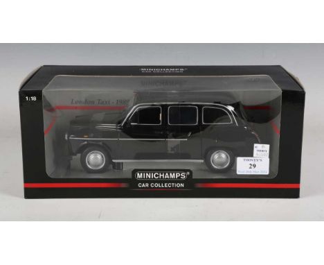 A Minichamps 1:18 scale London Taxi 1989, within a window box.