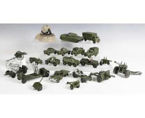 A collection of Dinky Toys and Supertoys army vehicles and guns, including No. 661 recovery tractor, No. 689 medium artillery