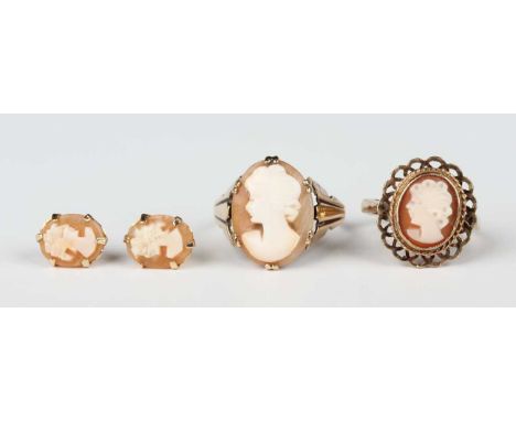 A 9ct gold and oval shell cameo ring, decorated with a pierced border, London 1975, ring size approx K, a gold and oval shell