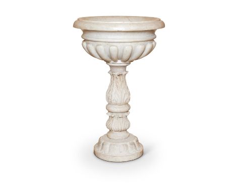 AN ITALIAN SCULPTED WHITE MARBLE CISTERN OR FONT19TH CENTURY The lobed circular section basin raised on an acanthus carved ba