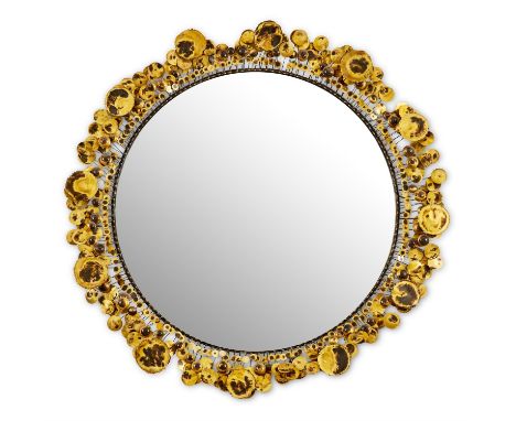 A LARGE BRASS 'RAINDROPS' MIRRORIN THE MANNER OF CURTIS JERE, LATE 20TH CENTURYThe plate within a circular frame issuing pati