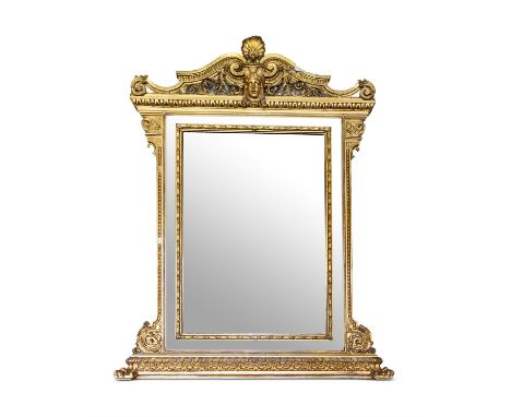 AN ITALIAN CARVED GILTWOOD AND COMPOSITION OVERMANTEL WALL MIRROR19TH CENTURYWith central shell and mask to the cresting, the