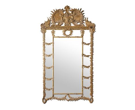 A MONUMENTAL GILTWOOD AND COMPOSITION WALL MIRRORLATE 19TH CENTURYOf large, impressive proportion, surmounted by acanthus mou
