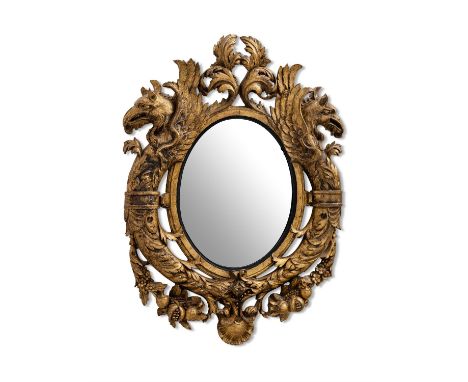 A PAIR OF ITALIAN GILT WOOD WALL MIRRORS19TH CENTURYThe pierced carved surrounds with opposing eagles heads and foliage91cm h