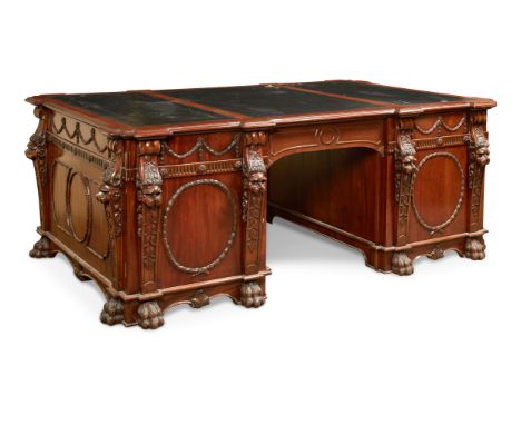 A CARVED MAHOGANY TWIN PEDESTAL PARTNERS DESKIN GEORGE III STYLE, LATE 19TH/EARLY 20TH CENTURYAfter the design by Thomas Chip