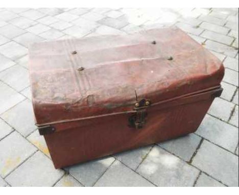 A hinge-lidded metal trunk