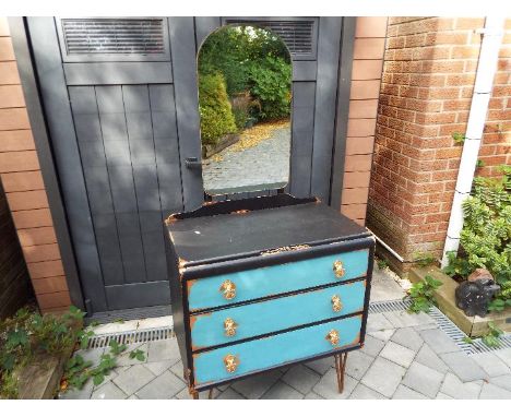 A mirror backed dressing table with three drawers, painted blue with gilded accents, 162 cm x 76 cm x 44 cm