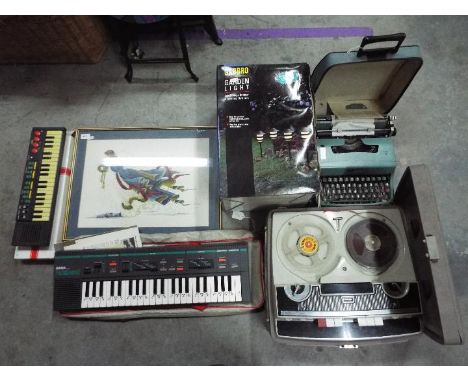 Lot to include a vintage Stella reel to reel recorder, two portable keyboards, boxed garden lights, portable typewriter and o