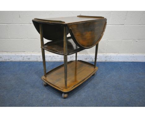 A STAINED ERCOL ELM AND BEECH THREE TIER DROP LEAF TEA TROLLEY, open width 96cm x closed with 48cm x depth 74cm x height 76cm