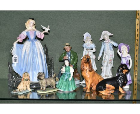 A GROUP OF FIGURINES AND FIGURES OF DOGS, comprising The Franklin Mint/The House of Fabergé 'Princess of the Ice Palace' with