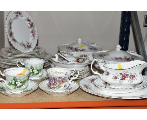 A QUANTITY OF ROYAL ALBERT 'LAVENDER ROSE' PATTERN DINNERWARE, comprising a large oval meat plate (marked as second quality),