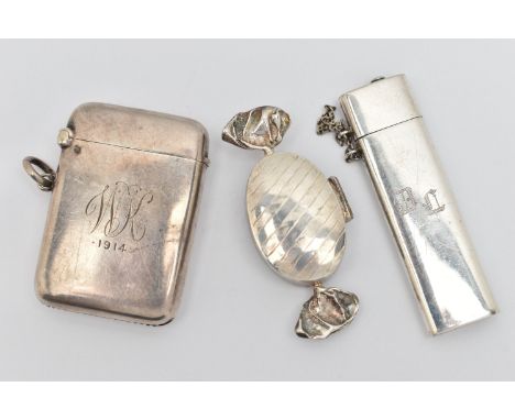 A SILVER VESTA CASE, A NEEDLE CASE AND A PILL BOX, polished rectangular vesta case with engraved initials dated 1914, striker