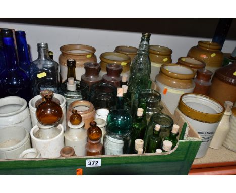 ONE BOX OF VINTAGE GLASS BOTTLES AND STONEWARE FLAGONS, to include four small flagons, eight large stoneware jars, ink jars, 