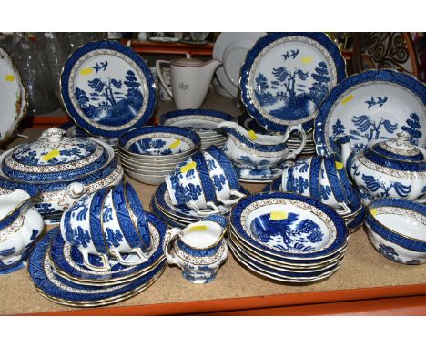 A COLLECTION OF BOOTHS 'REAL OLD WILLOW' PATTERN BLUE AND WHITE DINNER AND TEA WARE, A 8025, comprising a teapot, covered tur