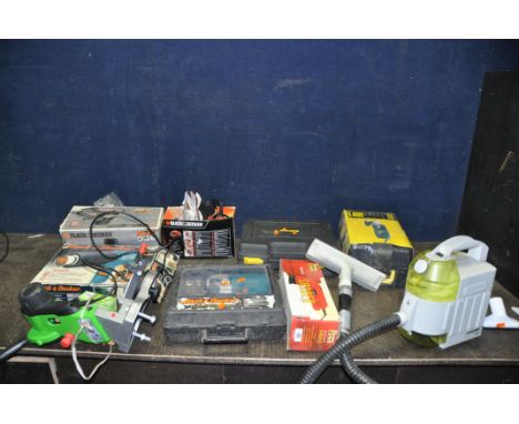 A COLLECTION OF POWER TOOLS including Black and Decker Mouse sander, orbital sander, Heat Gun, a Florabest chainsaw sharpener