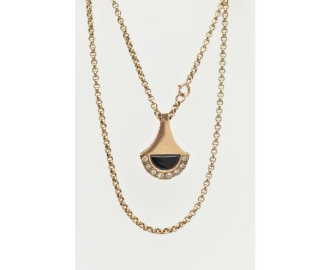 A 9CT YELLOW GOLD DIAMOND AND ONXY PENDANT WITH CHAIN, the abstract design pendant set with an onyx panel and round brilliant