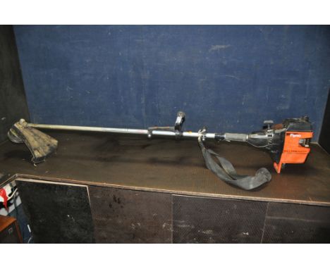 A FLYMO MAXI TRIM SUPER 32CC PETROL STRIMMER (engine pulls freely but hasn't been started)