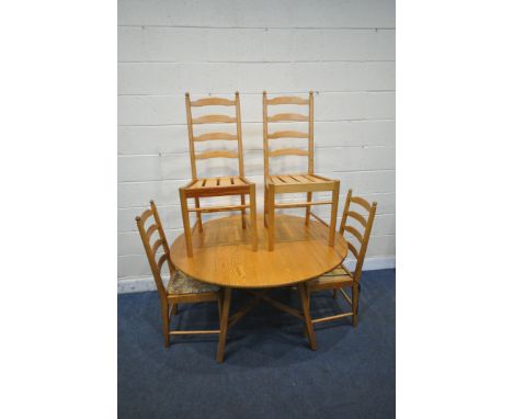 AN ERCOL MODEL 669 PINE DROP LEAF TABLE, open width 125cm x depth 114cm x height 73cm, along with a set of four pine Ercol la