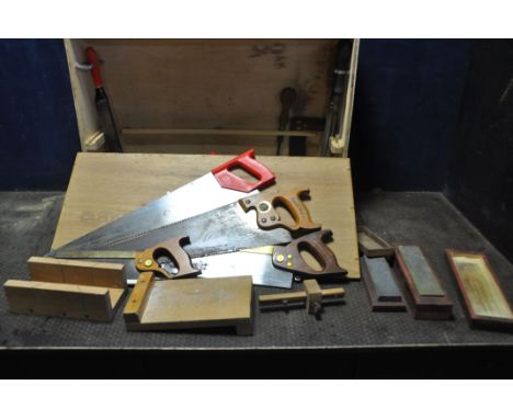 A BESPOKE CARPENTERS TOOLBOX CONTAINING TOOLS including Spear and Jackson saws, a mortice gauge, a tri square, sharpening sto