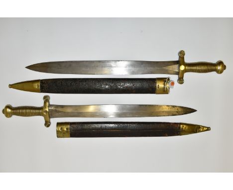 TWO MID 19TH CENTURY FRENCH ARMY CADETS GLADIUS SWORDS, in their original leather covered scabbards fitted with brass reinfor