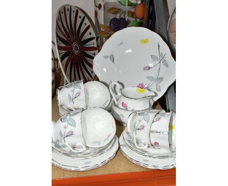 A ROYAL ALBERT 'TRENT ROSE' PATTERN TEA SET, comprising cake plate, milk jug, sugar bowl, six tea cups, six saucers, six tea 