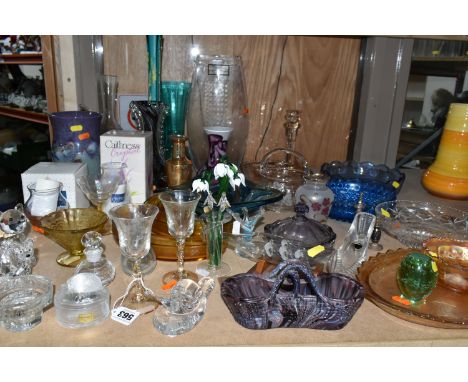 A COLLECTION OF COLOURED GLASSWARE, comprising an amethyst coloured Strathearn vase, height 20cm, two boxed Caithness Crystal