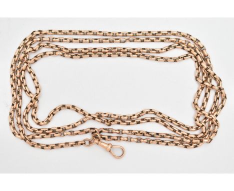 A YELLOW METAL LONGUARD CHAIN, two chains of elongated belcher links fitted together with a single lobster clasp, tag to chai