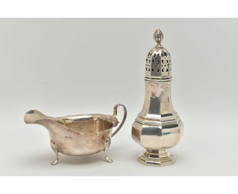 AN ELIZABETH II SILVER SAUCE BOAT AND A GEORGE V SUGAR CASTER, the polished sauce boat with wavy rim, fitted with a handle, r
