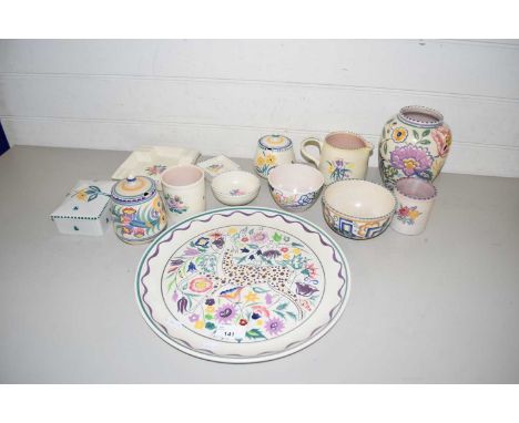 Collection of Poole pottery items to include a plate decorated with a deer, various small vases, preserve pots, trinket box, 