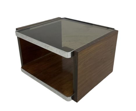 Contemporary coffee table, the smoked glass top over hardwood pot board base, raised on plastic castors Condition Report:Slig