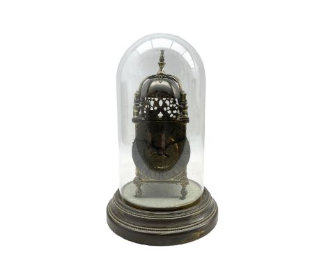 A small early 20th century replica Lantern clock with a French twin train striking movement and lever platform movement, stri
